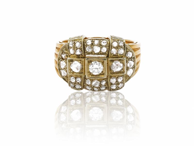 Anello a fascia in oro giallo e platino con diamanti