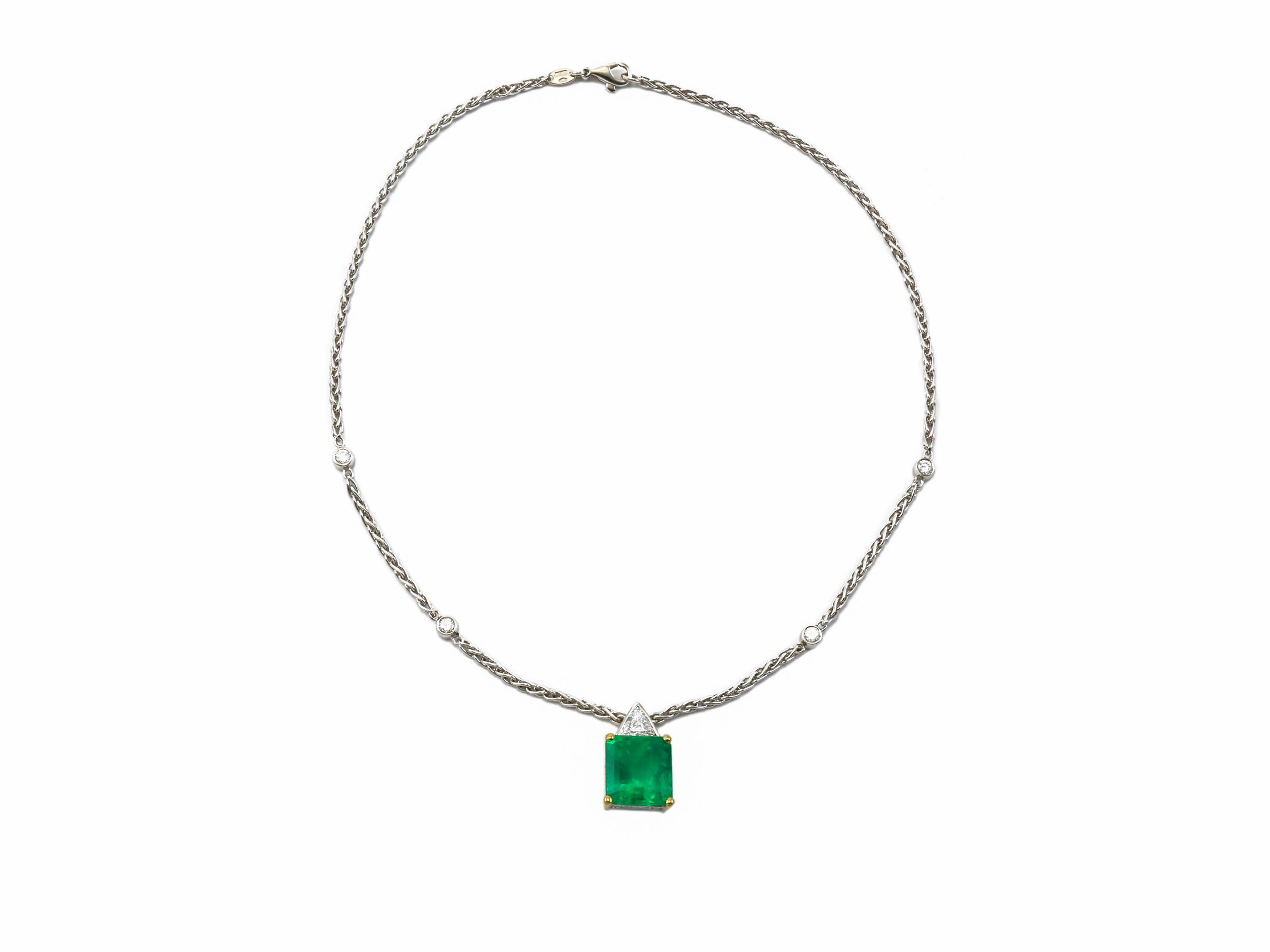 Collana in oro bianco e giallo con diamanti e smeraldo, firmata Crivelli