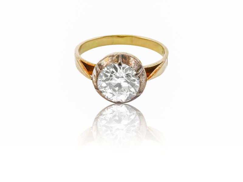 Anello solitario in oro giallo e argento con diamante