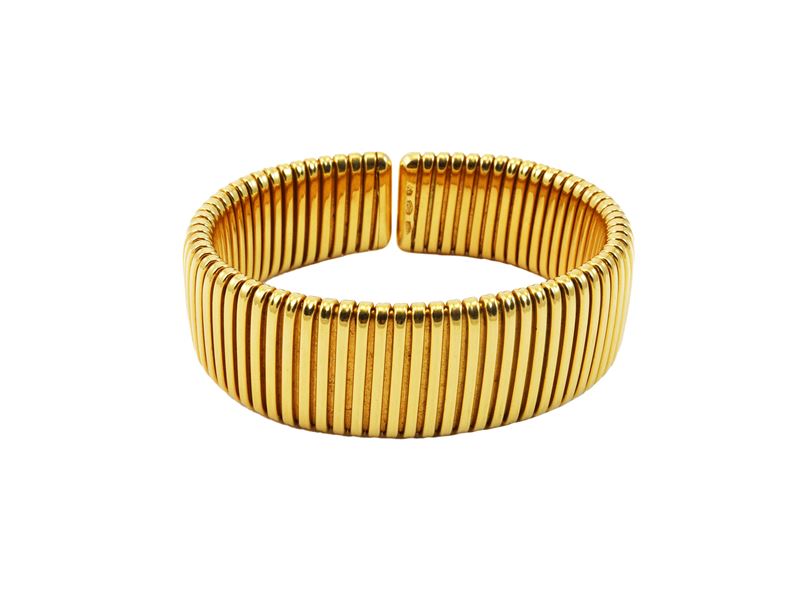 Bracciale semirigido tubogas firmato Weingrill in oro giallo