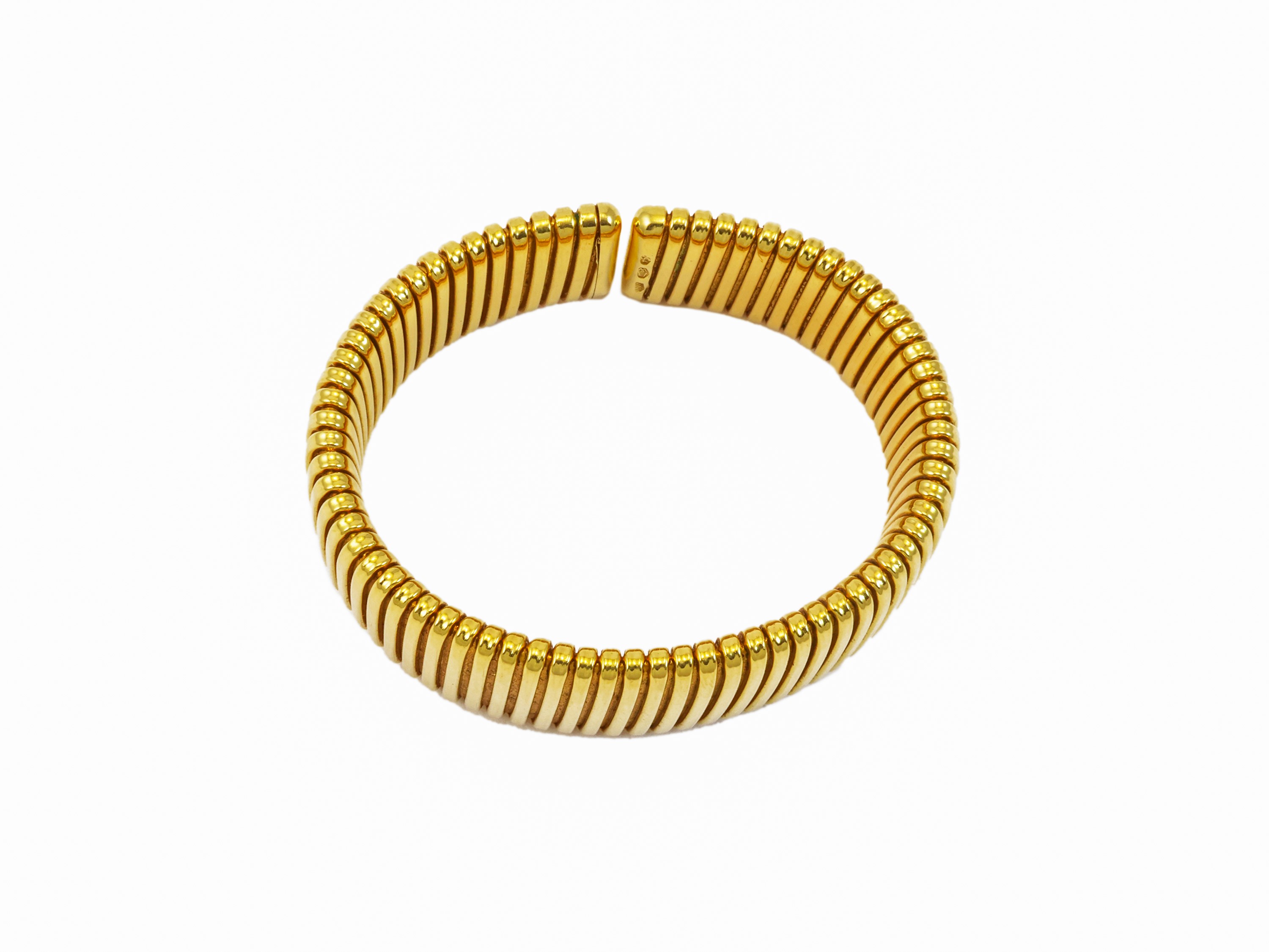 Bracciale semirigido tubogas firmato Weingrill in oro giallo