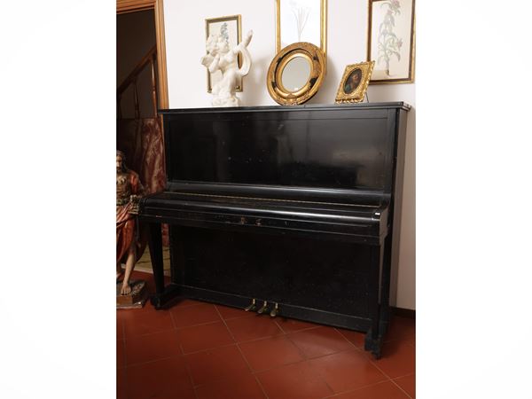 Upright piano in ebonized wood