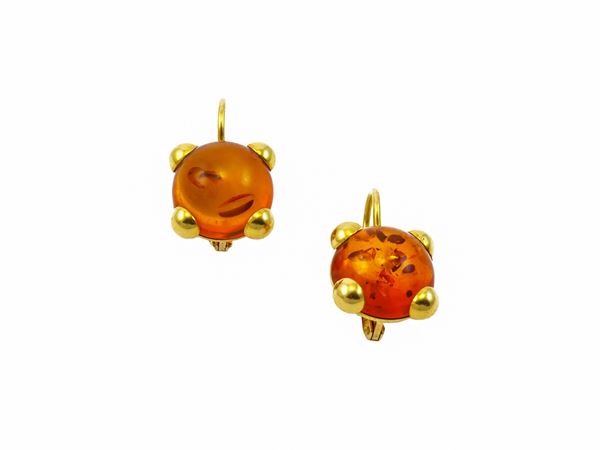 Orecchini in oro giallo pendenti con ambre cambochon