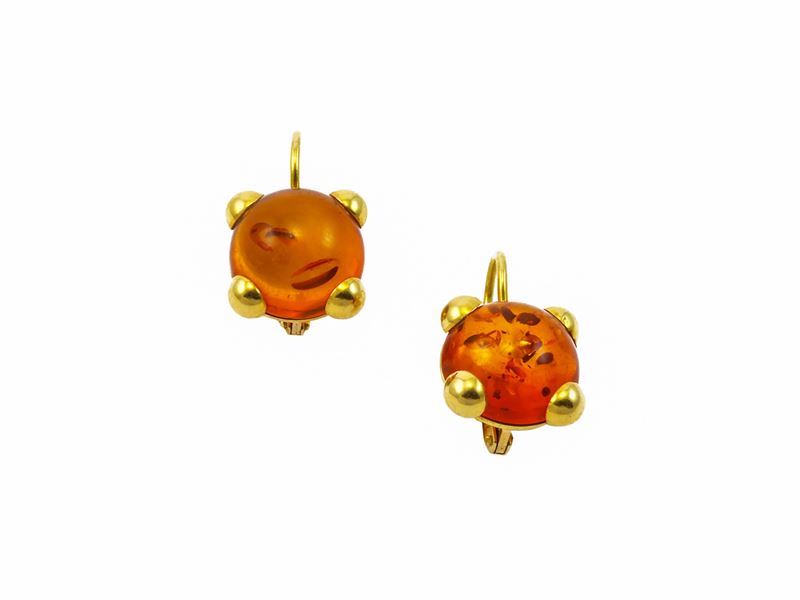 Orecchini in oro giallo pendenti con ambre cambochon