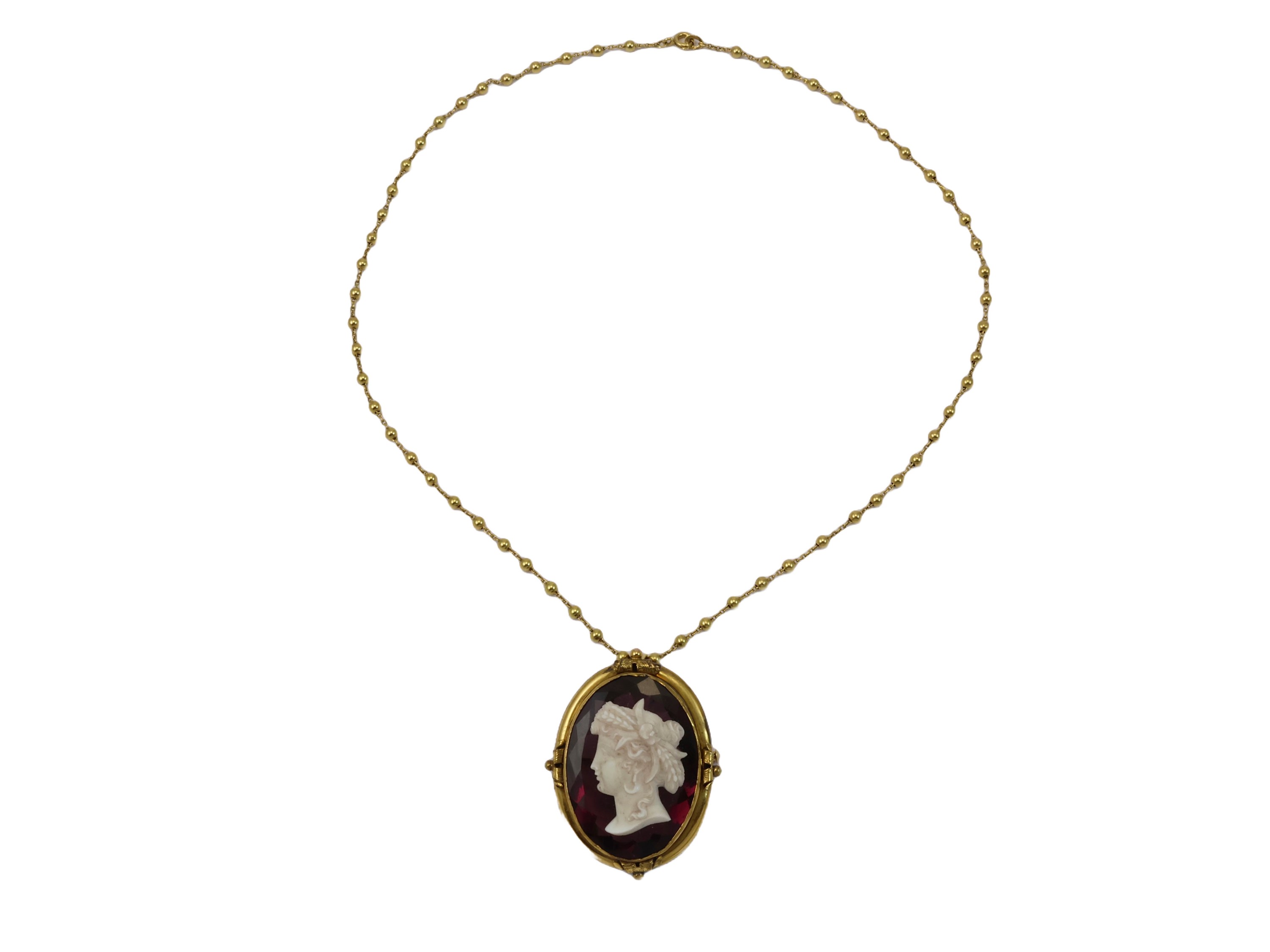 Collana in oro giallo con pendente/spilla in oro giallo e cammeo di donna