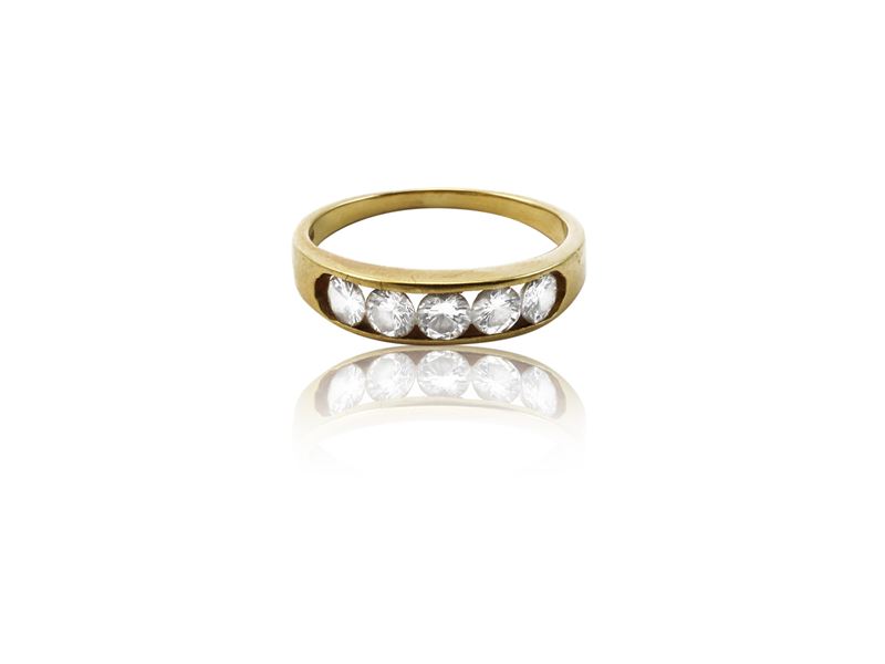 Anello rivière in oro giallo con diamanti