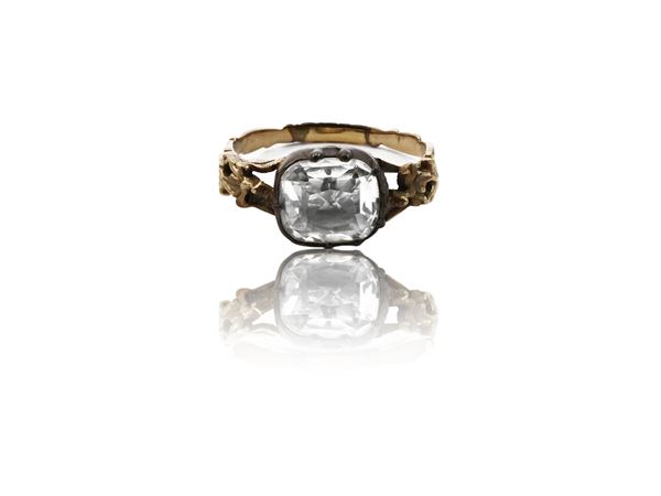 Solitaire ring in yellow gold and silver with colorless glass paste
