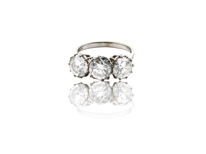Anello trilogy in oro bianco con diamanti