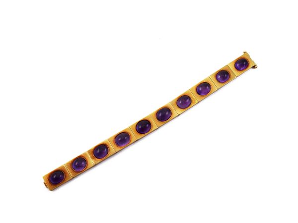 Bracciale a moduli in oro giallo e ametiste  (Anni Cinquanta)  - Asta Gioielli e Orologi - Maison Bibelot - Casa d'Aste Firenze - Milano