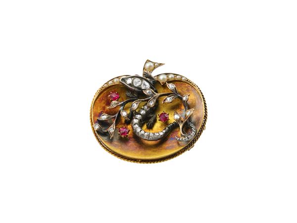 A 18Kt and 9Kt yellow gold, silver with rose-cut diamonds, rubies and micropearls brooch