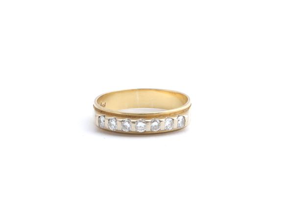 Damiani, anello riviere in oro giallo e diamanti