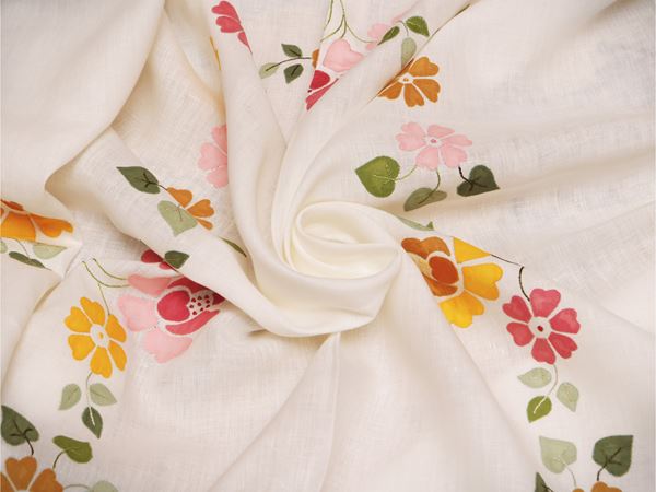 Embroidered white linen tablecloth
