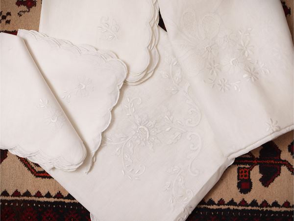 Two round white linen tablecloths