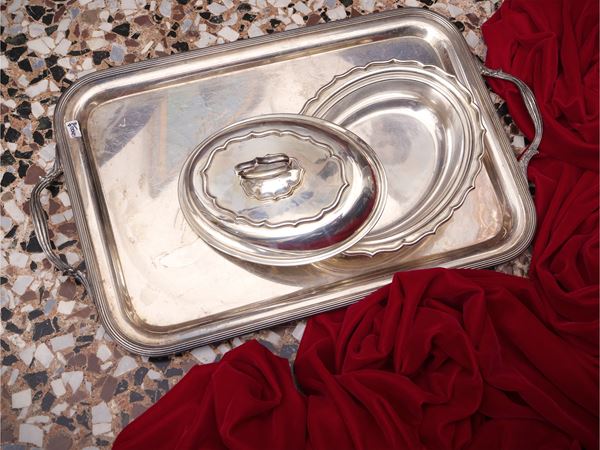 Two silver metal serving accessories
