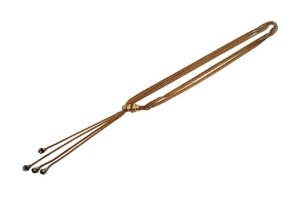 Golden tone metal latch necklace