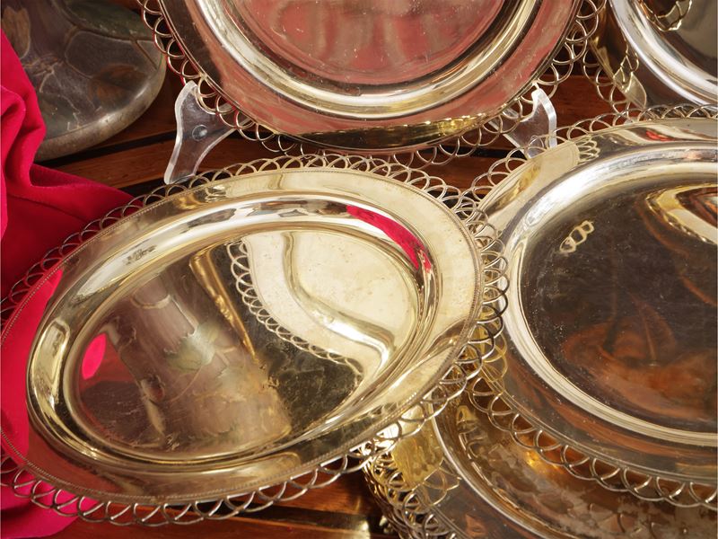 Serie di dodici piattini in argento vermeil