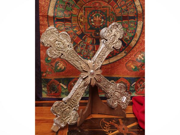 Processional cross covered in silver metal