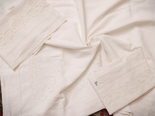 Two white linen double sheets