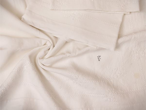 Two white linen double sheets
