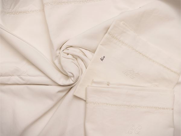 Two white linen double sheets