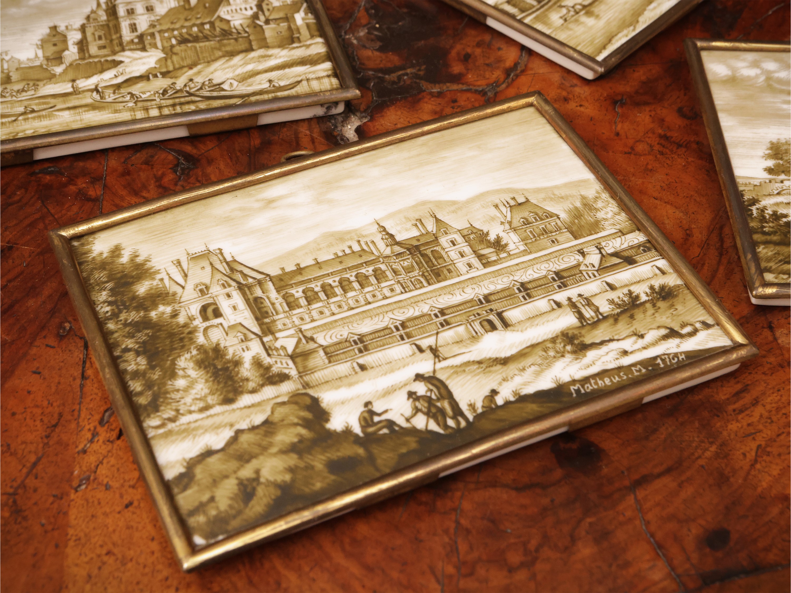 Sevres, Serie di quattro placchette in porcellana dipinte in monocromia