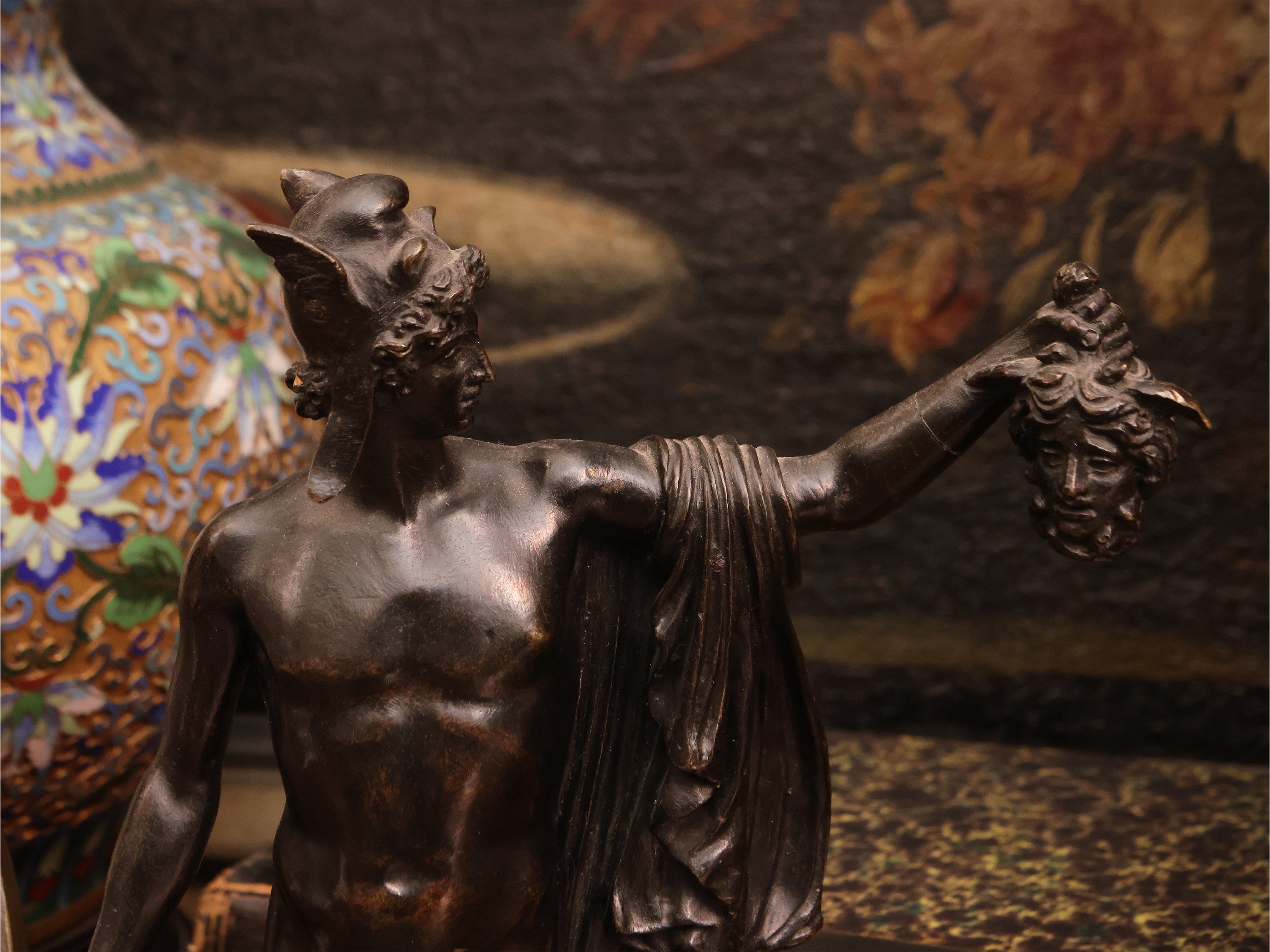 C. Badii, Due bronzi decorativi raffiguranti Perseo e placca a bassorilievo