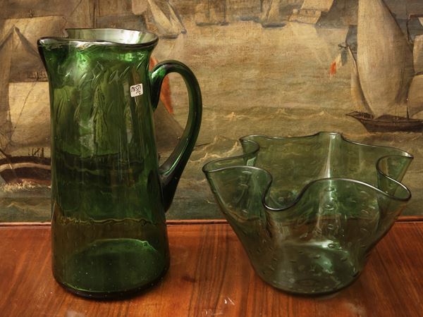 Two green glass vases from Empoli