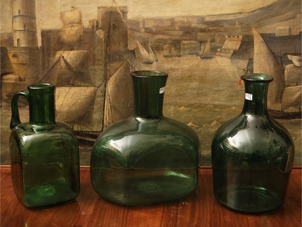 Three green glass bottles from Empoli
