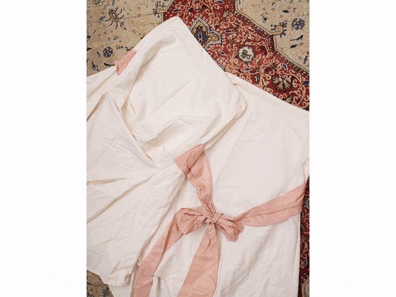 Serie di otto housse per sedie in cotone color avorio