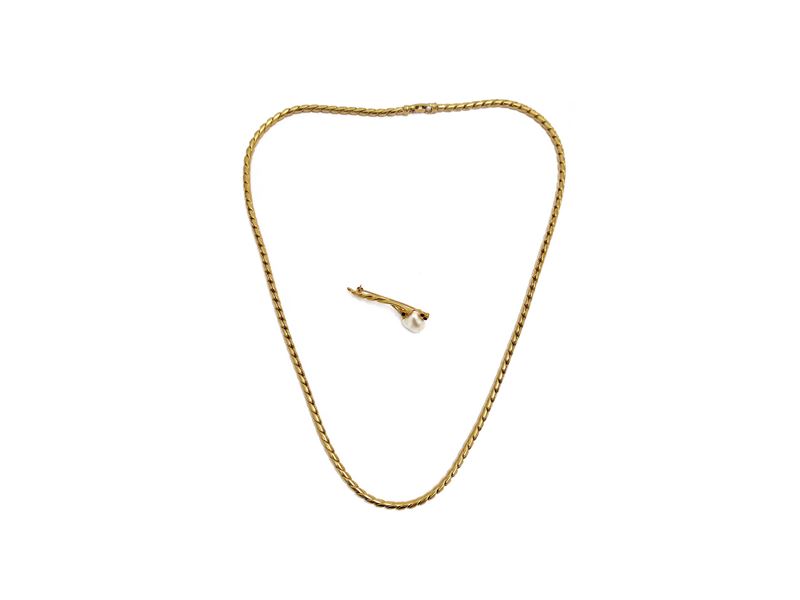 Collana e spilla in metallo golden tone