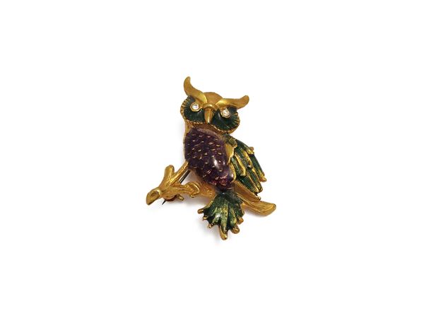 Animalier brooch in gold tone enamel and metal