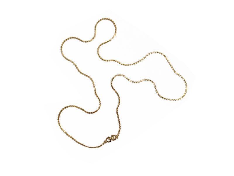 Christian Dior, Collana lunga dorata firmata