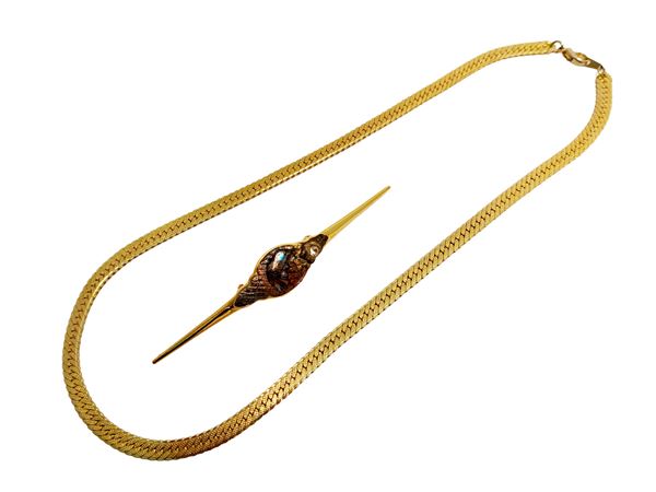 Collana placcata oro e Spilla a baguette