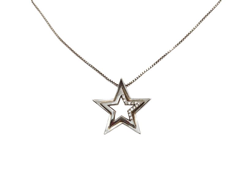 Collanina con pendente in argento 925 a forma di stella con strass