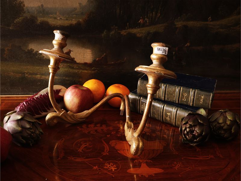 Coppia di appliques in legno e metallo dorato