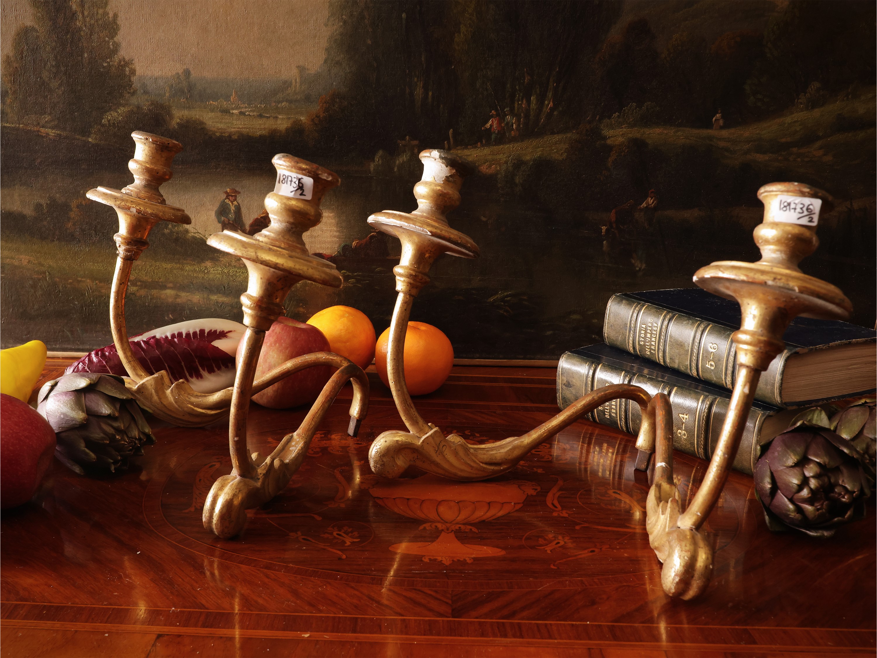 Coppia di appliques in legno e metallo dorato