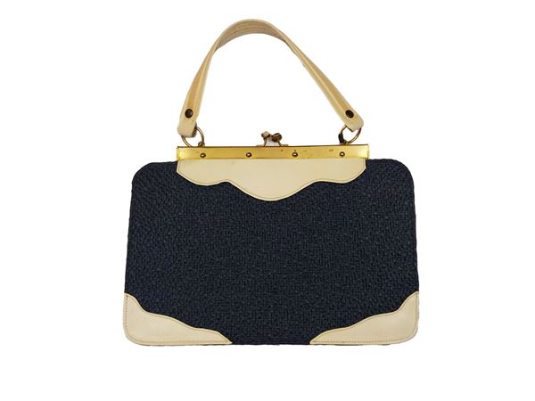 Handbag in blue raffia and ivory leather