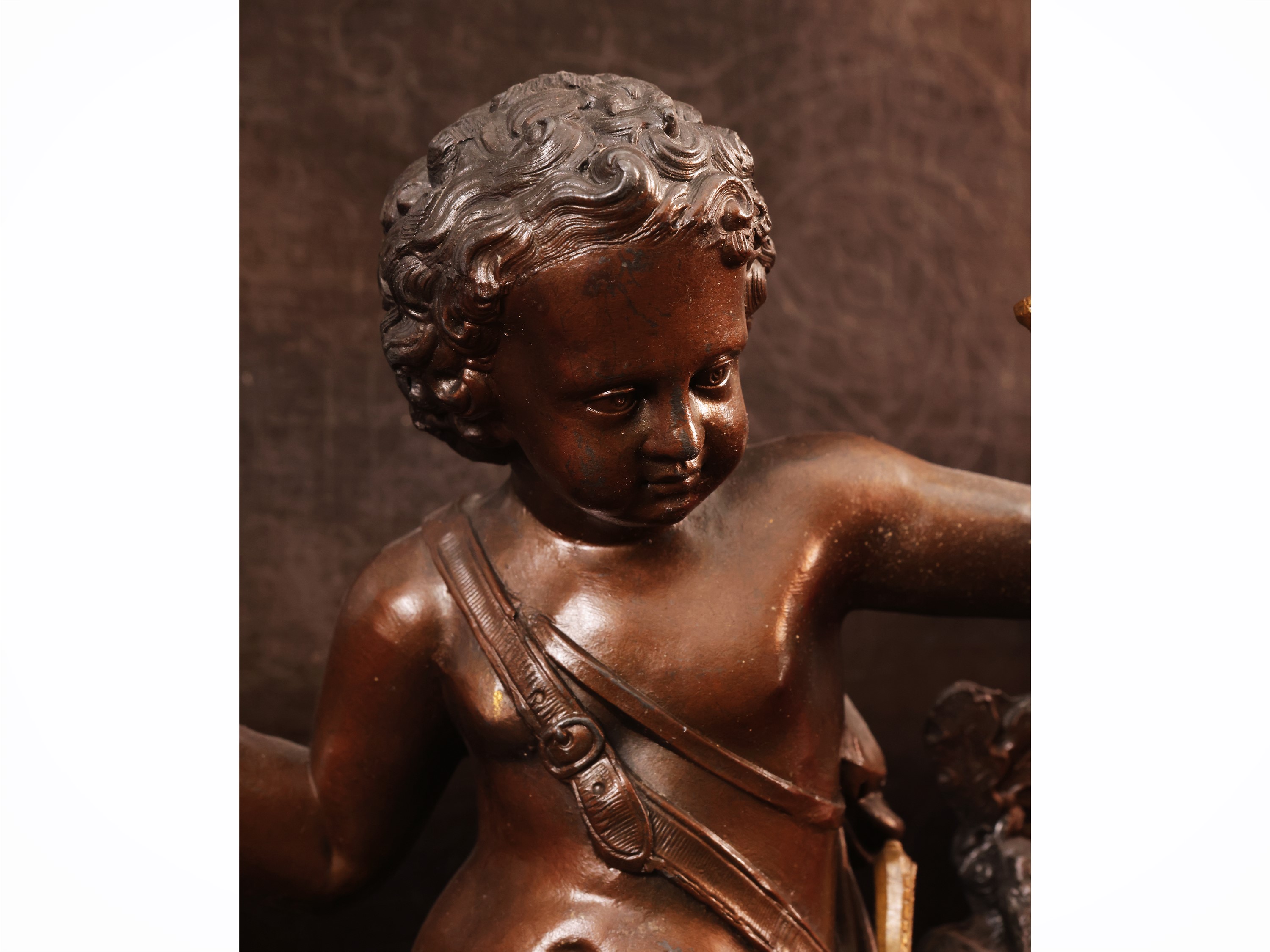 Orologio da tavolo in antimonio dorato e patinato