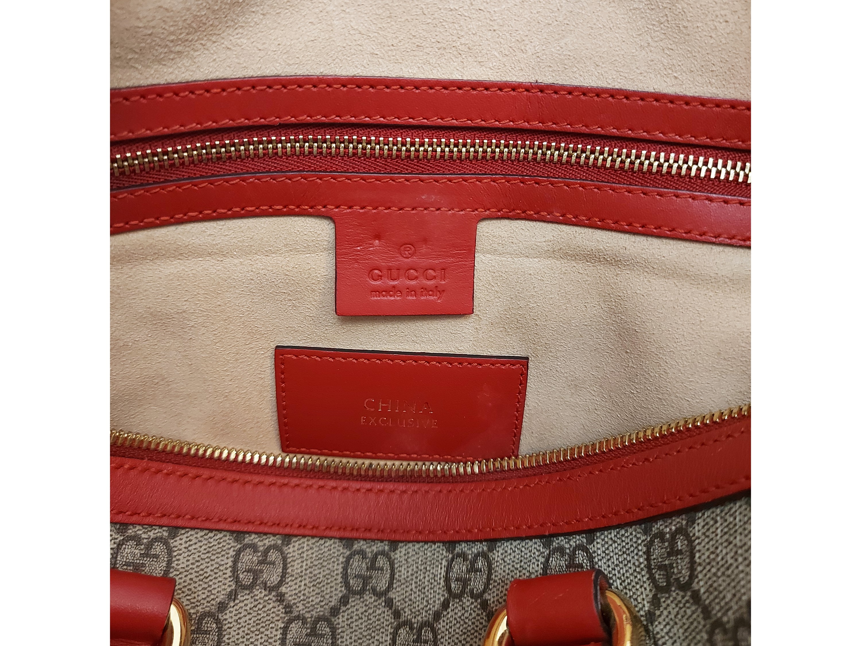 Gucci - Bauletto Boston in tela monogram GG supreme e pelle rossa