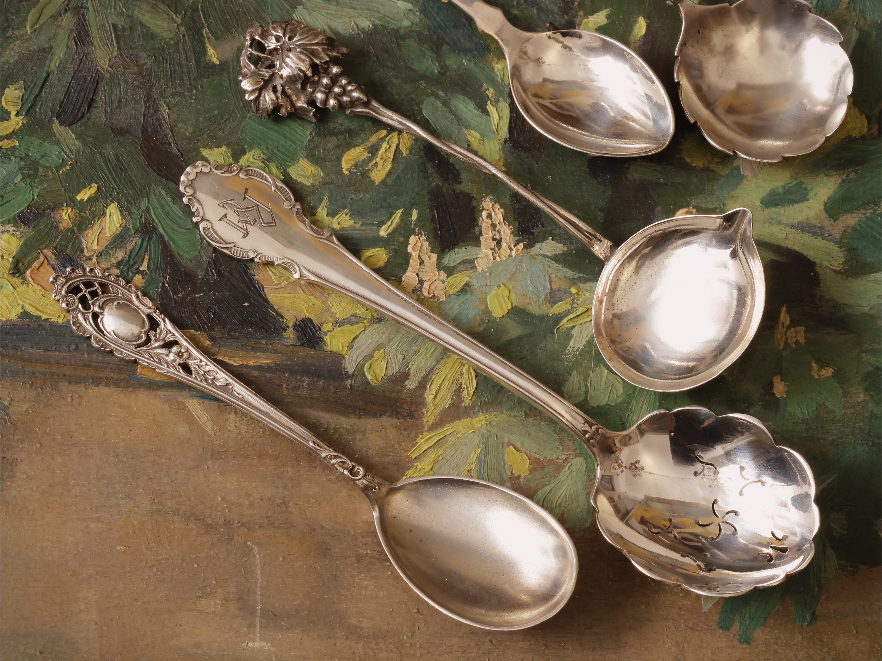 Dodici cucchiaini da collezione in argento