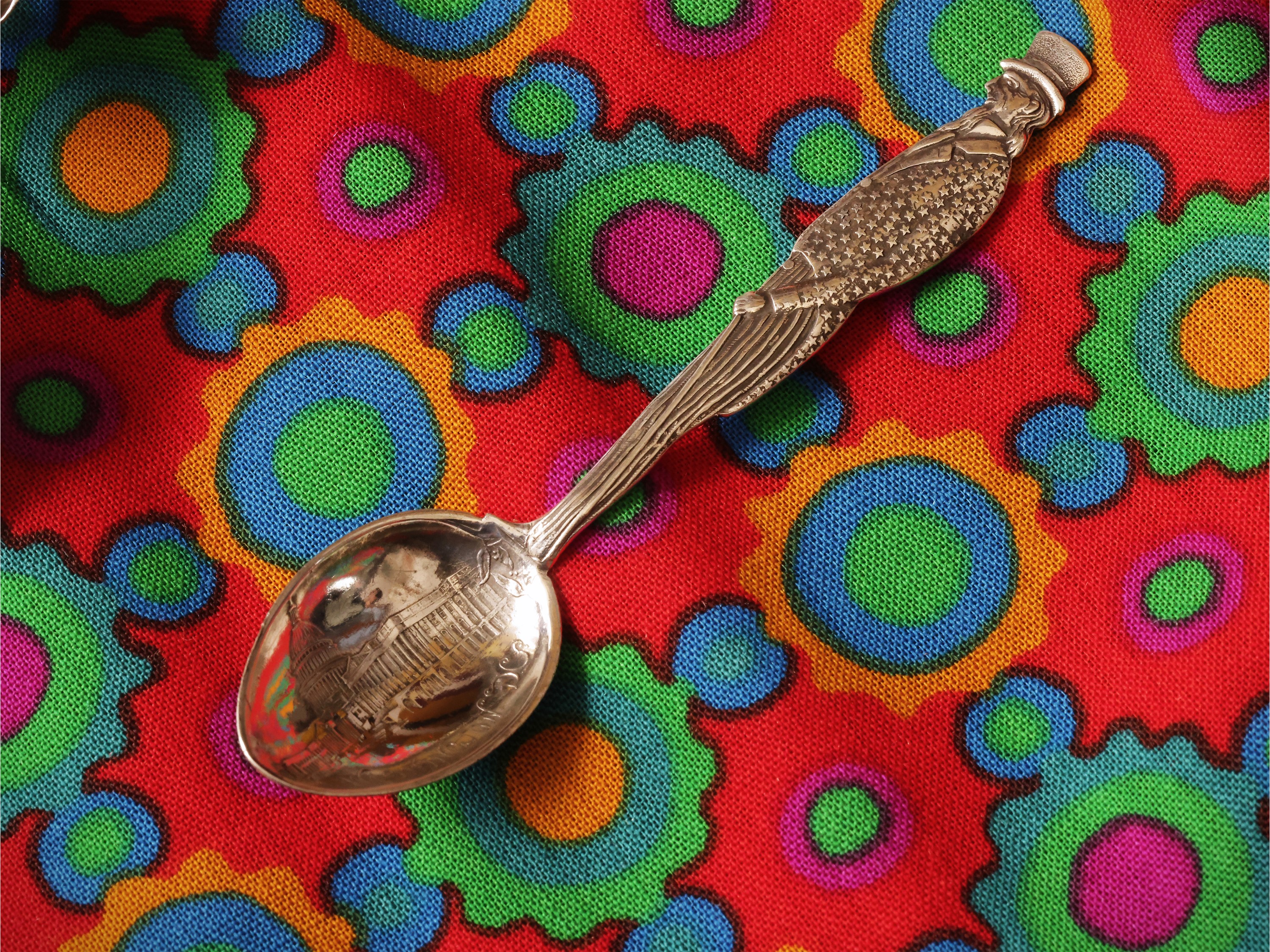 Dodici cucchiaini da collezione in argento sterling