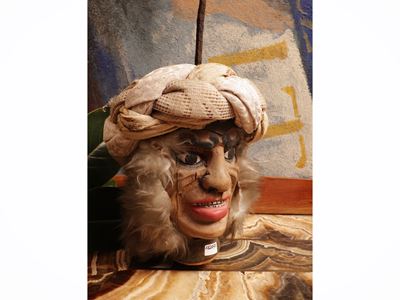 Testa di pupo in legno dipinto, XIX/XX secolo