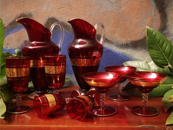 Set of ruby red blown glass glasses