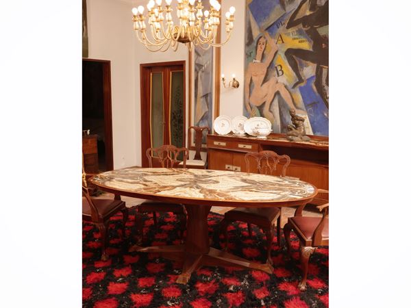 Dining table with onyx top