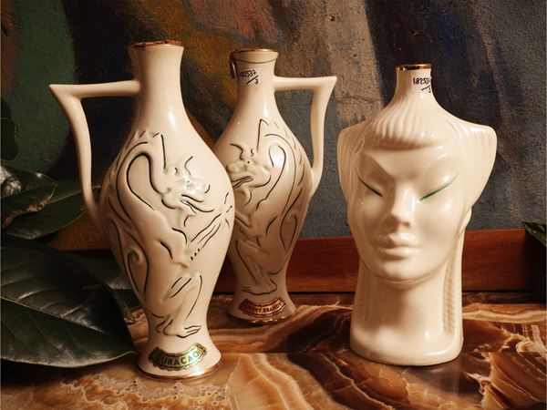 Three white ceramic liqueur bottles, Canova Padova