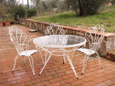 Set da giardino, tavolo circolare laccato bianco con piano in vetro e sei poltroncine