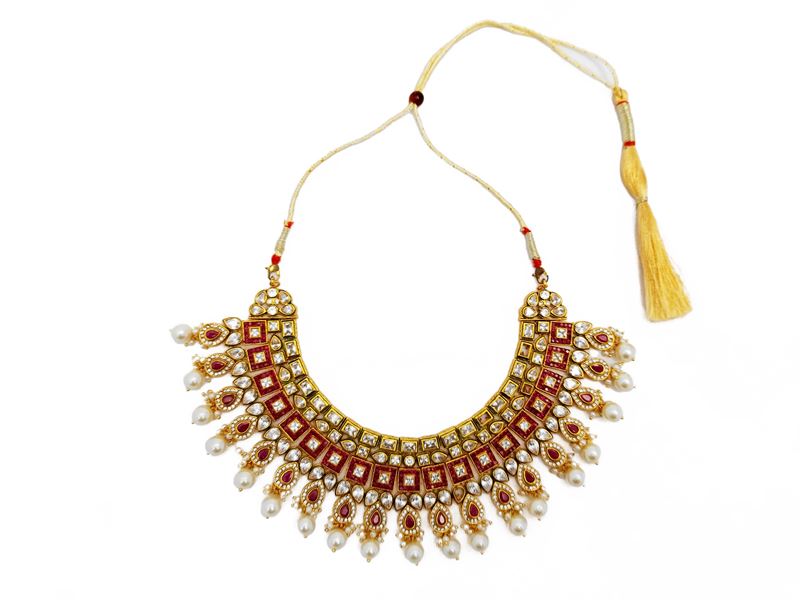 Importante collier in metallo dorato