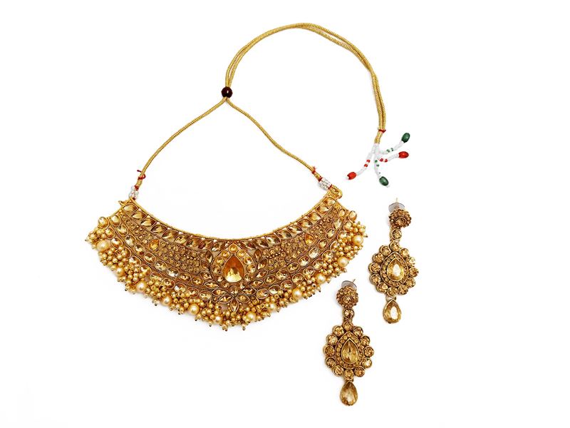 Demi parure Collier e Orecchini in metallo dorato