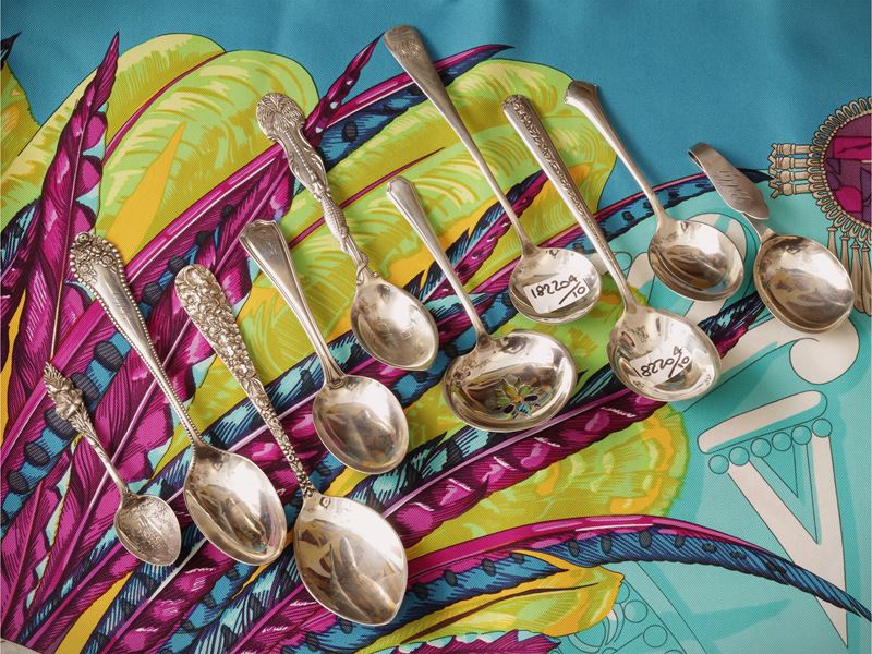 Dieci cucchiaini da collezione in argento sterling