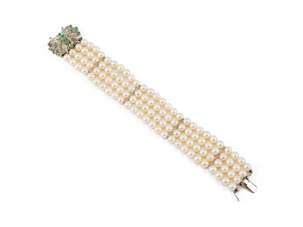 Bracciale a quattro fili di perle bianche coltivate e oro bianco